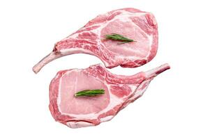 Marbled raw pork chops meat steak or tomahawk. Isolated on white background, Top view. photo
