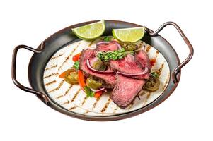 Carne Asada Tacos with grilled steak, green sauce, jalapenos and onion, Mexican food. Isolated on white background. Top view. photo