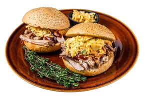 Pulled Pork meat Hamburger with coleslaw salad. Isolated on white background. photo