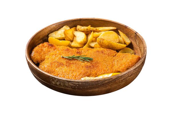 Austrian fried weiner schnitzel with potato wedges in a wooden plate. Isolated on white background. Top view.