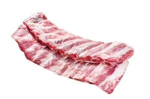 Fresh raw pork ribs with spices and herbs. Isolated on white background. Top view. photo