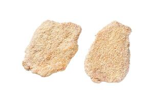 Raw chicken schnitzel Escalope in breadcrumbs. Isolated on white background, top view. photo