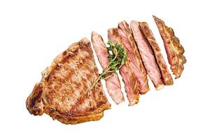 Grilled Strip New York steak or striploin. Beef meat steak. Isolated on white background. Top view. photo