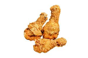 Spicy Deep Fried Breaded Chicken drumsticks. Isolated on white background. Top view. photo
