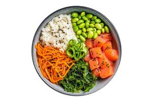 Hawaiian Poke bowl with Salmon, Edamame and Rice. Isolated on white background. photo