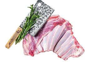 Butcher table with Rack of lamb, raw mutton ribs with meat cleaver. Isolated, white background. photo