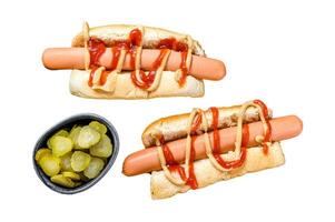 Hot Dog with Yellow Mustard and red ketchup. Isolated on white background. Top view. photo