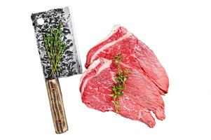 Raw veal meat chop steak. Isolated on white background, Top view. photo