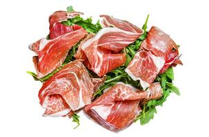 Italian parma prosciutto crudo dried ham Isolated on white background, Top view. photo
