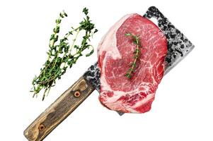 Raw beef striploin on the bone meat steak. Isolated on white background, Top view. photo