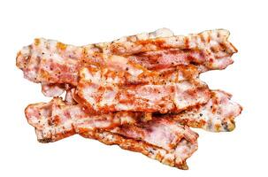 Cooked sizzling hot tasty crispy bacon. Isolated on white background. Top view. photo