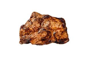 Pork cutlet steak on the bone with spices and herbs. Isolated on white background. photo