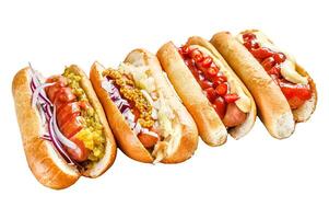 Hot dogs fully loaded with assorted toppings on a tray. Delicious hot-dogs with pork and beef sausages. Isolated on white background. Top view. photo
