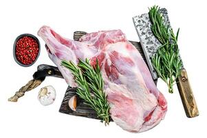 Raw lamb shoulder meat ready for baking with garlic, rosemary. Isolated on white background, Top view. photo
