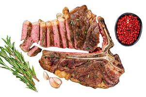 Grilled italian Florentine or t bone beef meat Steak Isolated on white background, top view. photo