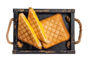 American hot Grilled cheese sandwich in wooden tray isolated on white background. top view photo