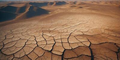 an aerial view of the dry and cracked land in the sty. photo