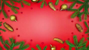 New Year's frame made of Christmas tree branches, Christmas balls and cones. Copy space place for your text. Stop motion animation banner video