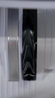 Work of counter machine. Currency counting equipment. Electronic banknote counter counting euro bills. Finance business concept. Close-up. Vertical video