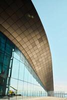 The Modern Architectural Design of a Curved Building Facade showcases innovative aesthetics photo