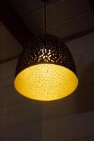 Stylish and Elegant Pendant Light Featuring a Decorative Pattern to Enhance Your Space photo