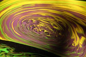 A Vibrant Abstract Swirl of Colors in Continuous Motion and Dynamic Energy Displaying photo