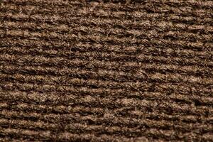 An Intricate and Textured Brown Fabric CloseUp That is Perfect for Various Design Inspirations photo