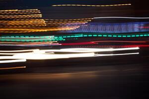 Dynamic Night Scene Featuring Colorful Light Trails That Captivate and Mesmerize Viewers photo