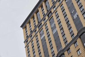 The modern architectural building design within a bustling urban setting emphasizes creativity photo