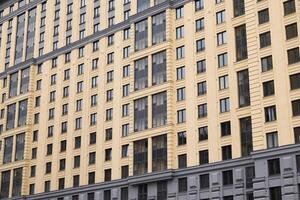Contemporary Modern Apartment Building Facade Featuring Beautifully Designed Glass Windows photo