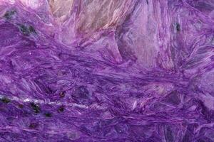 macro mineral stone Charoite on a white background photo
