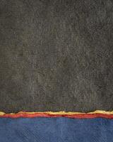 vivid abstract paper landscape in vertical format - collection of handmade textured art papers photo