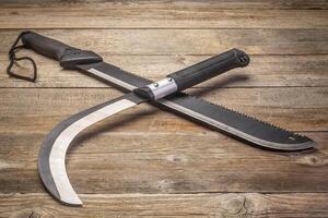 bush clearing sickle and machete photo