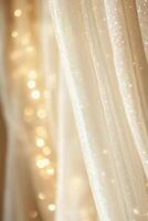 Softly glowing curtains with twinkling lights in a serene indoor space. photo