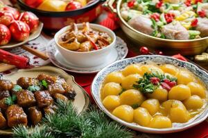 A table with many different dishes of food photo
