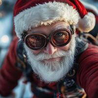 A man wearing a santa hat and goggles photo