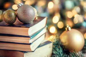 Christmas books and ornaments on a table photo