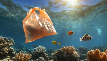 Plastic bag floating in the ocean with fish photo