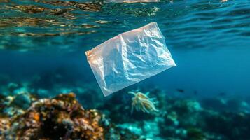 Plastic bag floating in the ocean photo