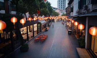 A serene street adorned with glowing lanterns in the evening. photo