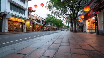 A quiet street adorned with lanterns, showcasing a cultural atmosphere. photo