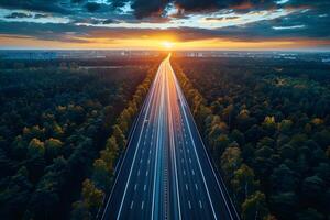 Majestic Highway at Sunset Surrounded by Lush Forest, Concept of Journey and Freedom photo