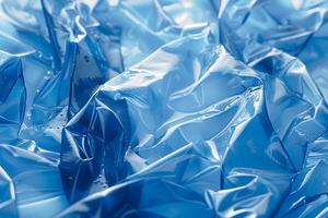 Abstract Blue Plastic Texture with Crumpled Shiny Surface for Design Use photo