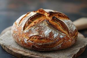 Rustic Artisan Sourdough Bread on Wooden Board for Bakery and Culinary Design photo