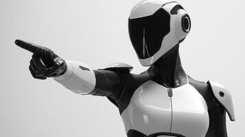 A sleek humanoid robot points at the viewer, showcasing advanced technology in the studio photo