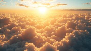 The soft sunlight breaks through the clouds at dawn, casting a warm glow over the sky and surrounding clouds photo