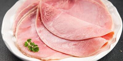 Ham slice pork meat fresh tasty food dish delicious gourmet food background on the table rustic food top view copy space photo