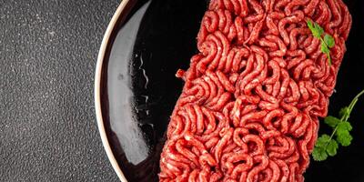 minced meat fresh beef, pork meat tasty eating cooking meal food snack on the table copy space food background rustic top view photo