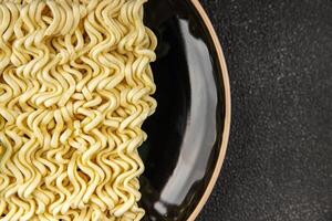 instant noodles raw fast food fresh tasty food dish delicious gourmet food background on the table rustic food top view copy space photo