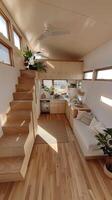 A small kitchen and living room in a tiny house photo